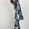 DiDi Easy loose dress in Black with Shell symphony print.- Jurken & Tunieken